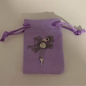 The Giving Keys Silver “Believe” Mini Key Necklace